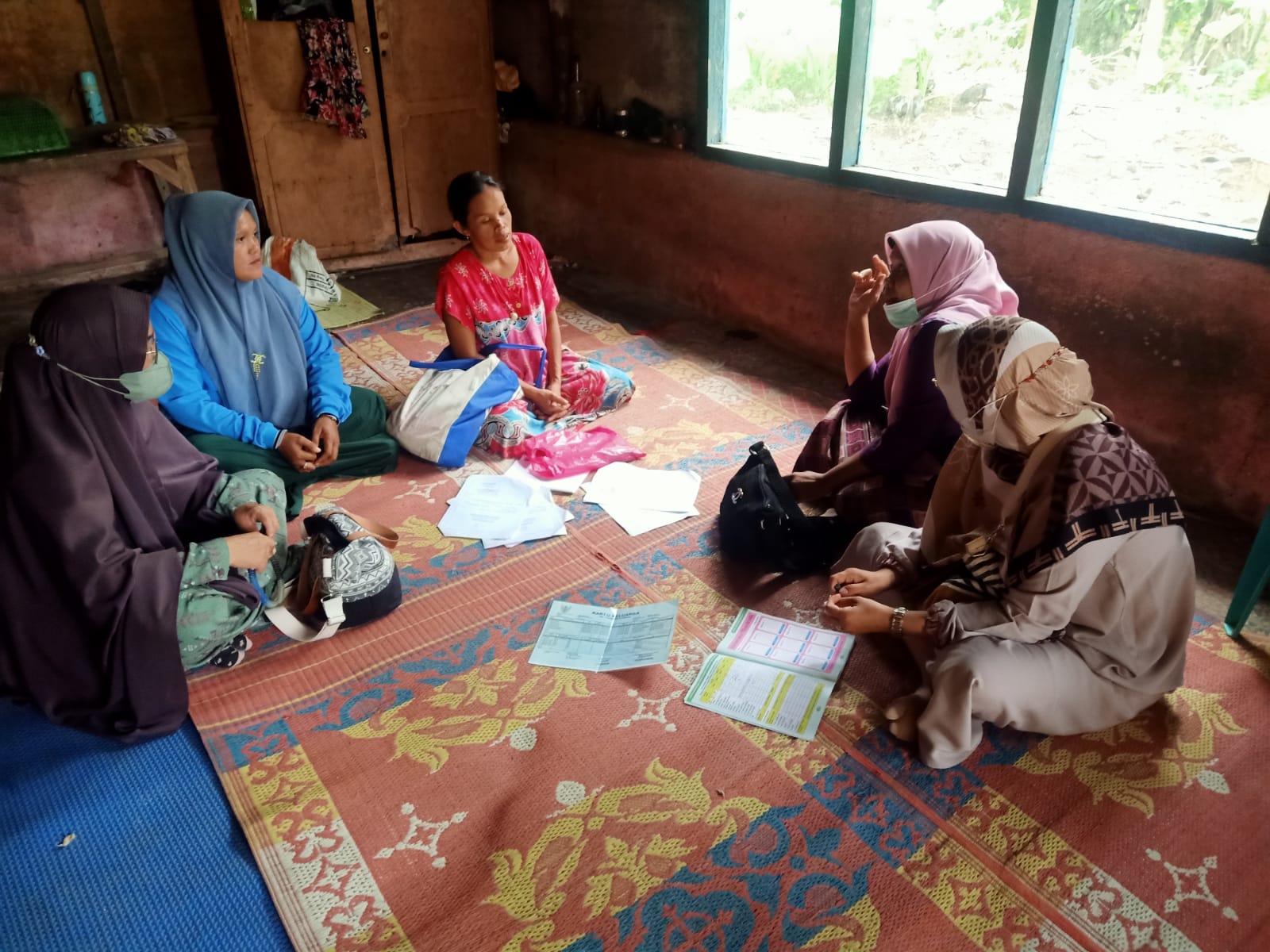 Kunjungan ibu hamil resiko tinggi dengan sifilis ke korong duku bersama tim pengelola ibu dan bidan desa